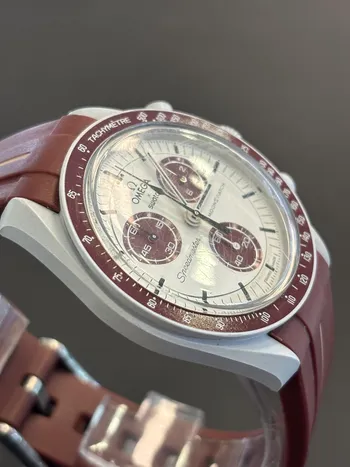 OMEGA SWATCH במצב מצוין כולל רצועה חליפית